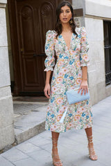 Floral midi dress with ruffled long sleeves