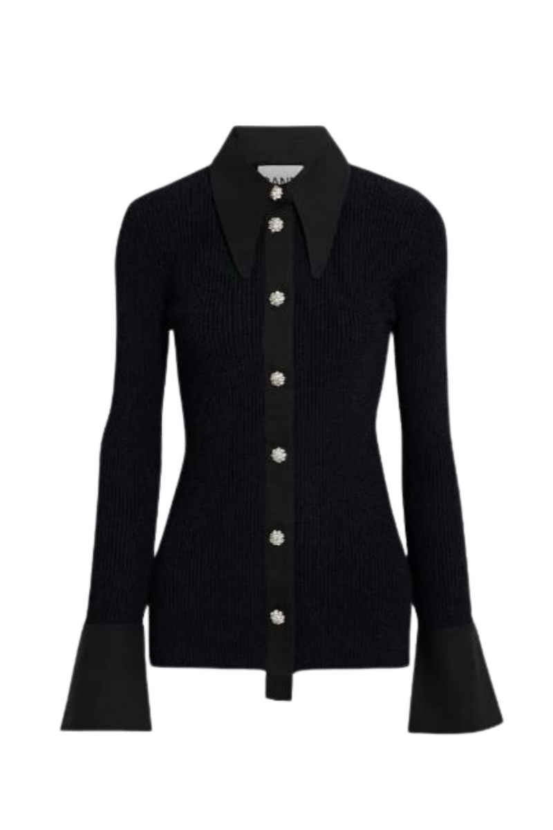 Black tight fitted top with diamond buttons and a detailed collar and sleeves