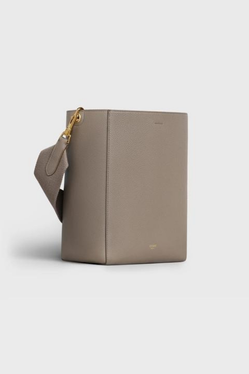 Taupe small bucket bag in soft grained calfskin with logo strap