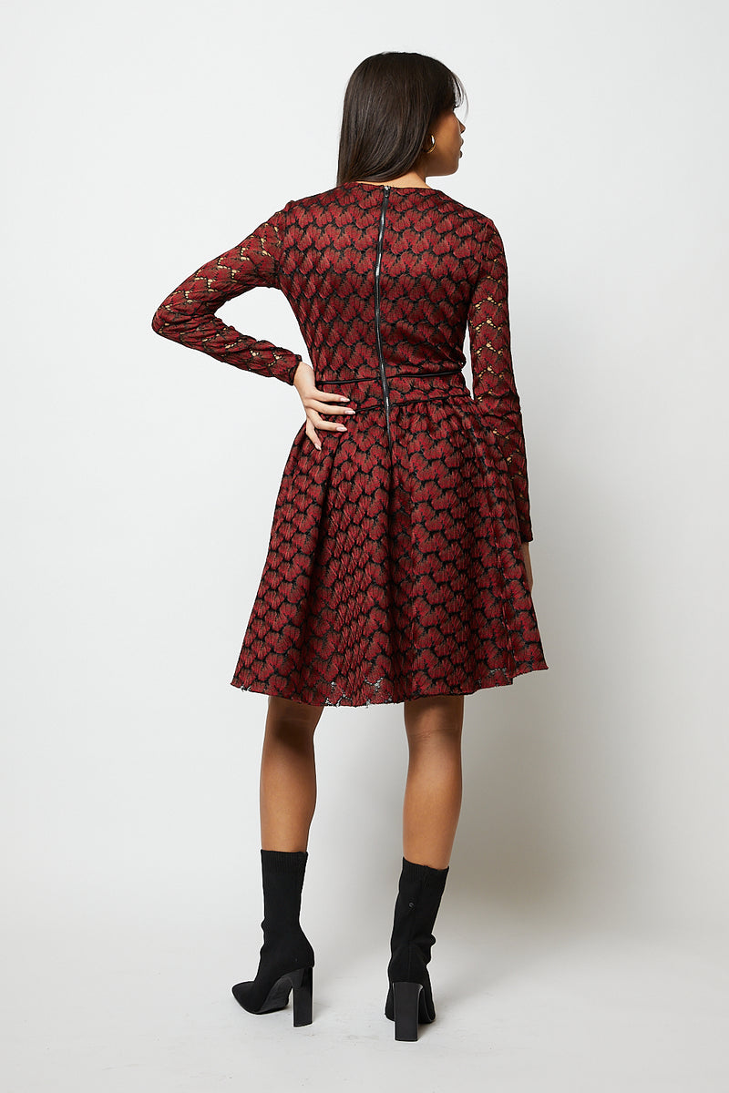 Black and red patterned mini dress with long sleeves