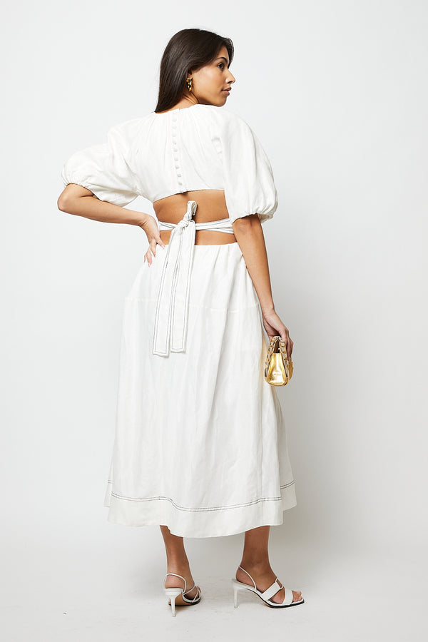White midi dress with puff sleeves and open back