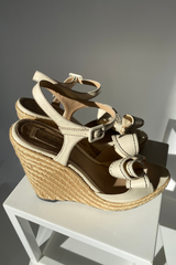 Beige leather wedges with bow
