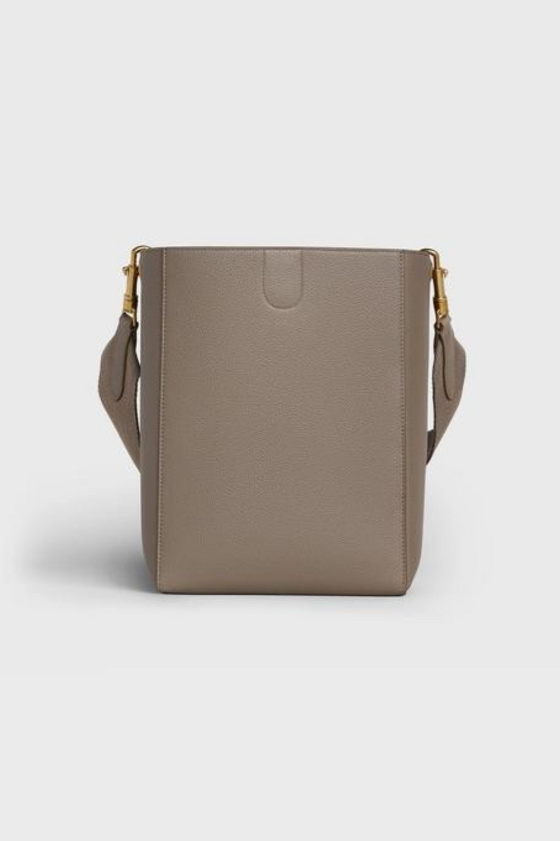 Taupe small bucket bag in soft grained calfskin with logo strap