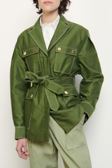 Green jacket with gold tone press studs