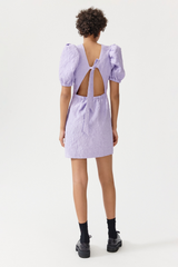 Purple mini dress with open back and puffer sleeves