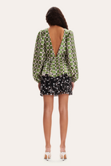 Green blouse with check pattern and puffer sleeves and open back