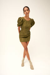 Green mini dress with open back and puffer sleeves