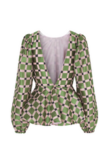 Green blouse with check pattern and puffer sleeves and open back