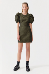 Green mini dress with open back and puffer sleeves